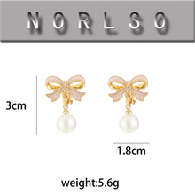 Load image into Gallery viewer, Pearl Bow Earrings Christmas Bow Earrings
